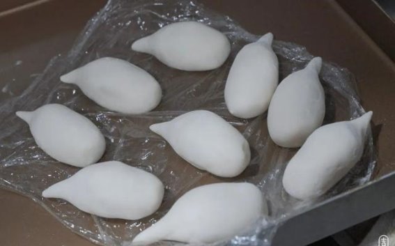 带尾巴的汤圆：探寻丰惠古镇的独特美味与人文风情